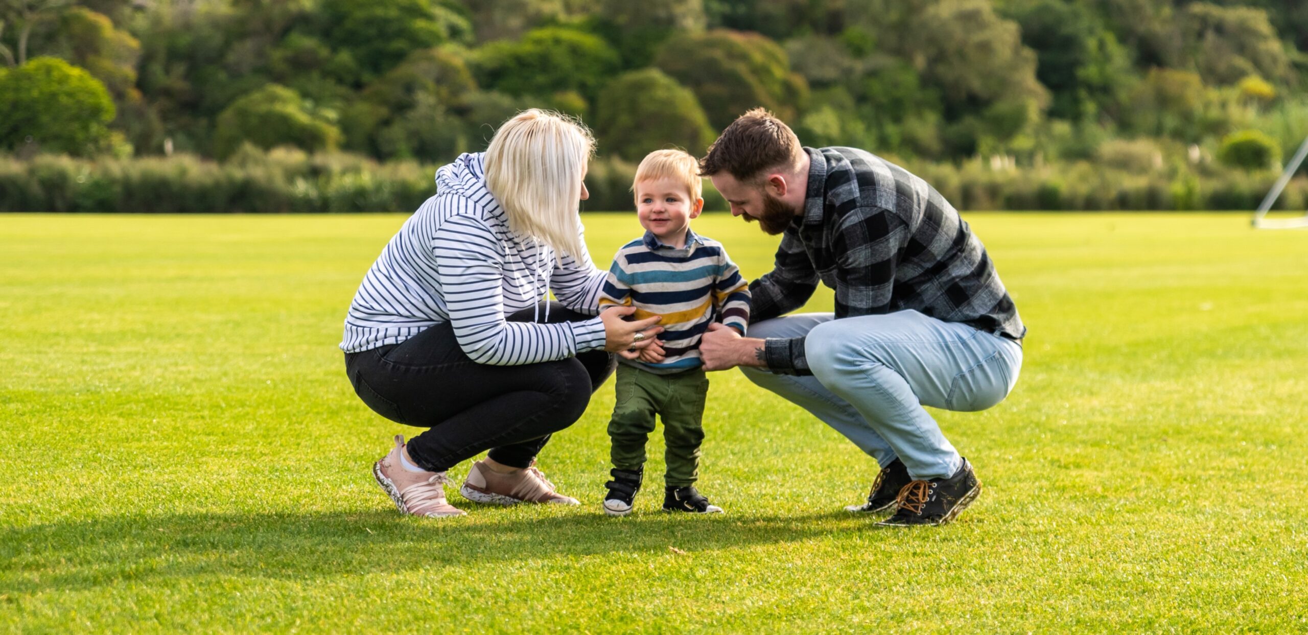 Young family enjoying park in Northcote, Auckland