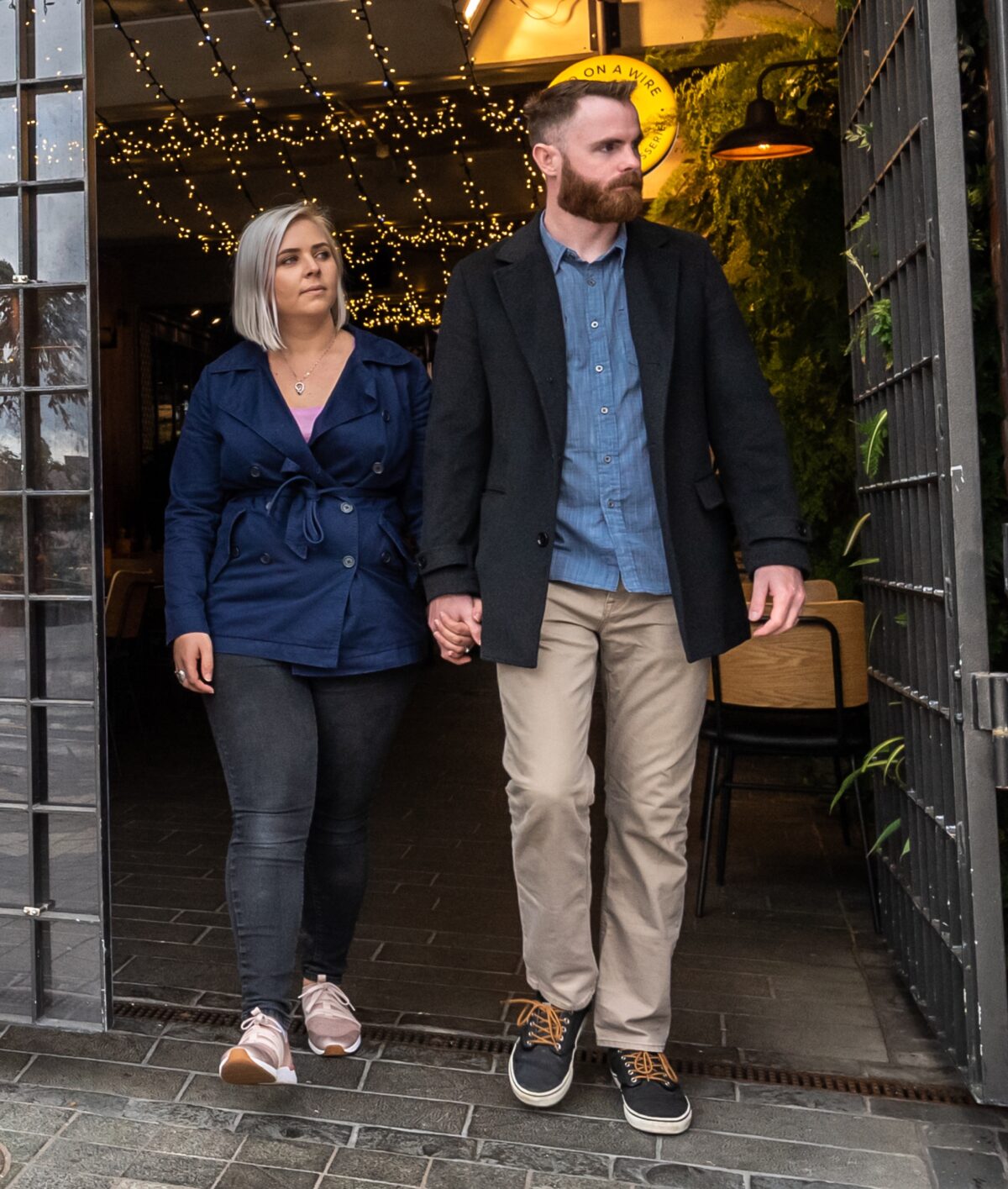 Young couple dining in Northcote bar.