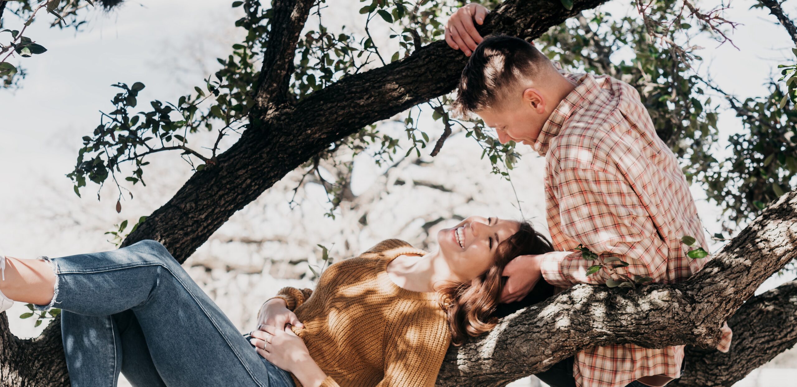 Young couple in tree