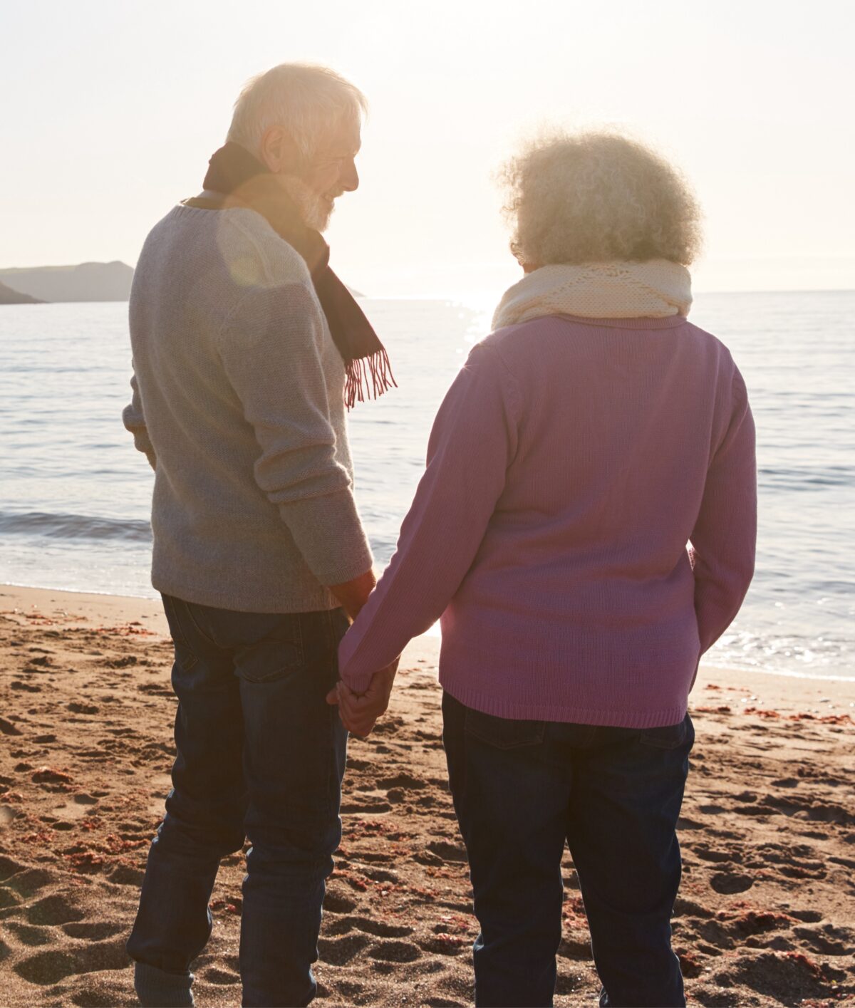 Senior couple on beach.